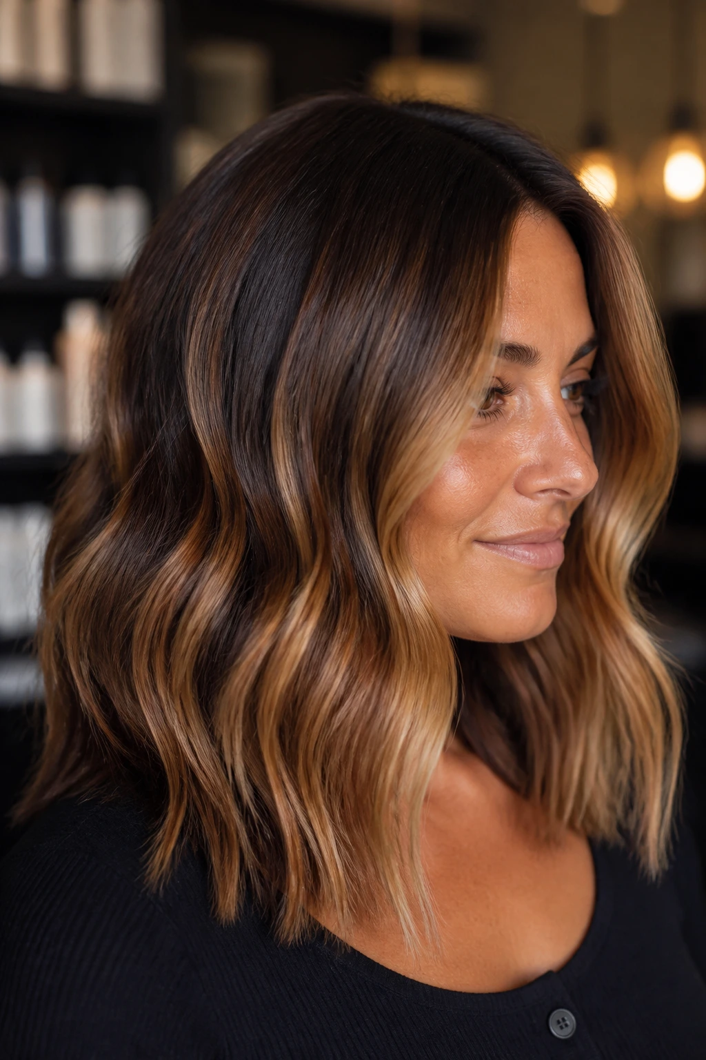 Rooted honey bronde on medium brunette with dimensional ribbons