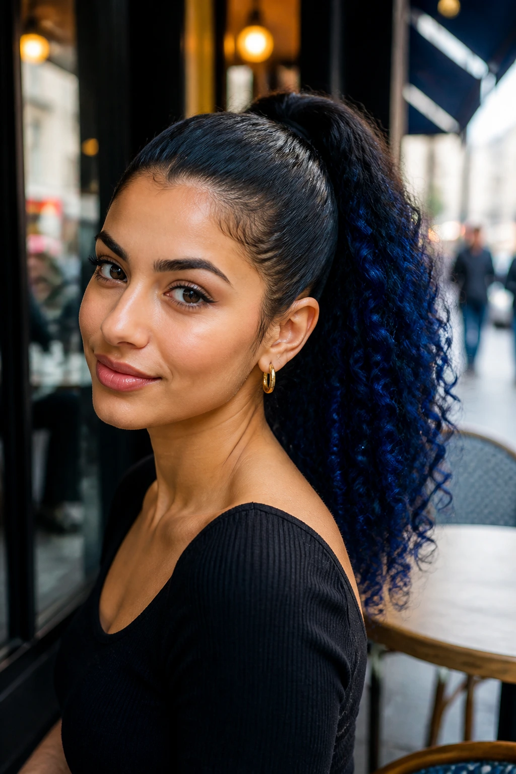 Portrait of a woman with sapphire-curly ponytail and black base