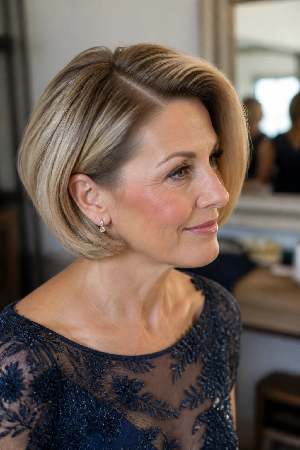 Close-up of a real woman with a sculpted bob and deep side part