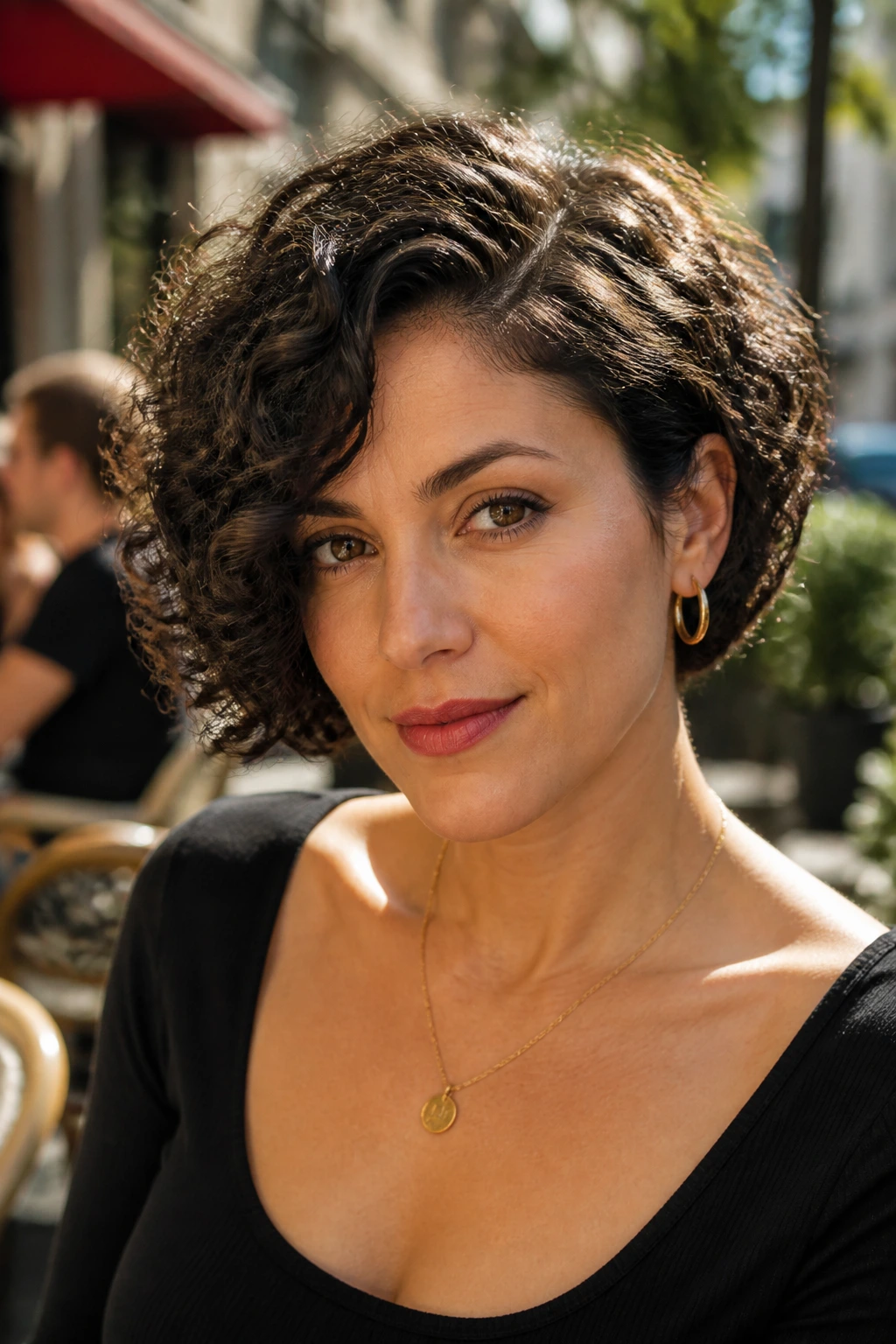 Real woman with a sculpted side-part bob in urban cafe light.
