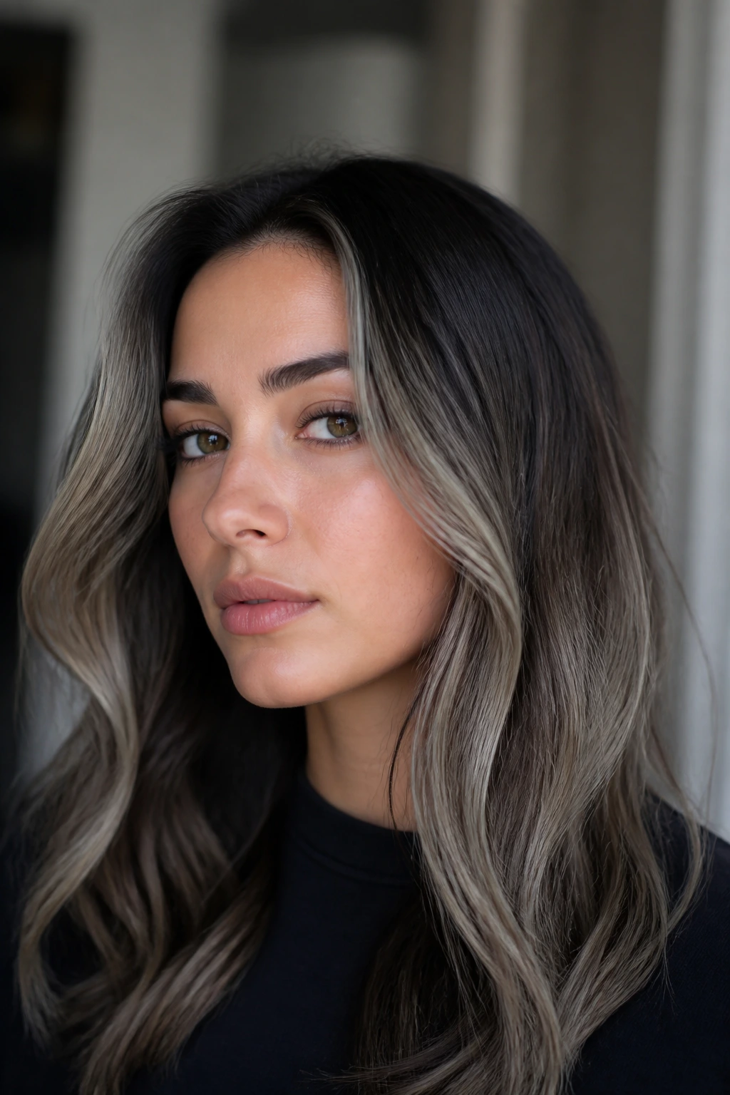 Real woman with cool blonde finish and shadow root