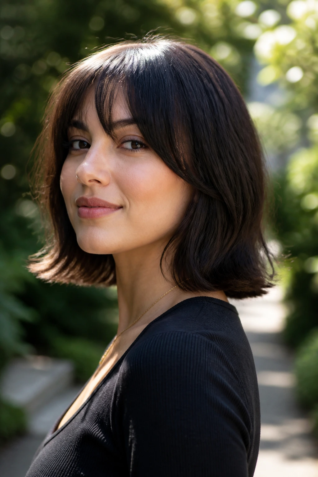 Real person showing shoulder-length hair with a small outward flip outdoors