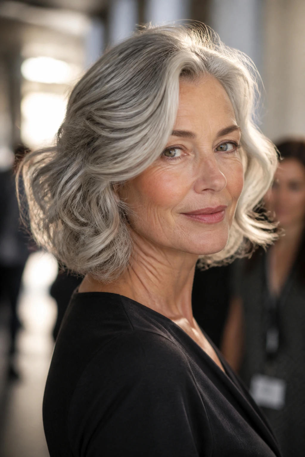 Portrait of a 50+ woman with lasting waves staying fresh during a long shoot