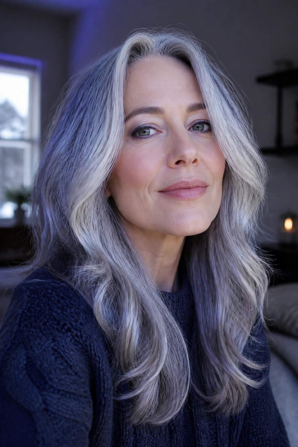Close-up of real person with cool-toned silver hair under cool lighting