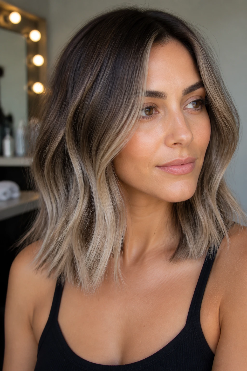 Close-up of a real person with smoked bronde ash-end hair