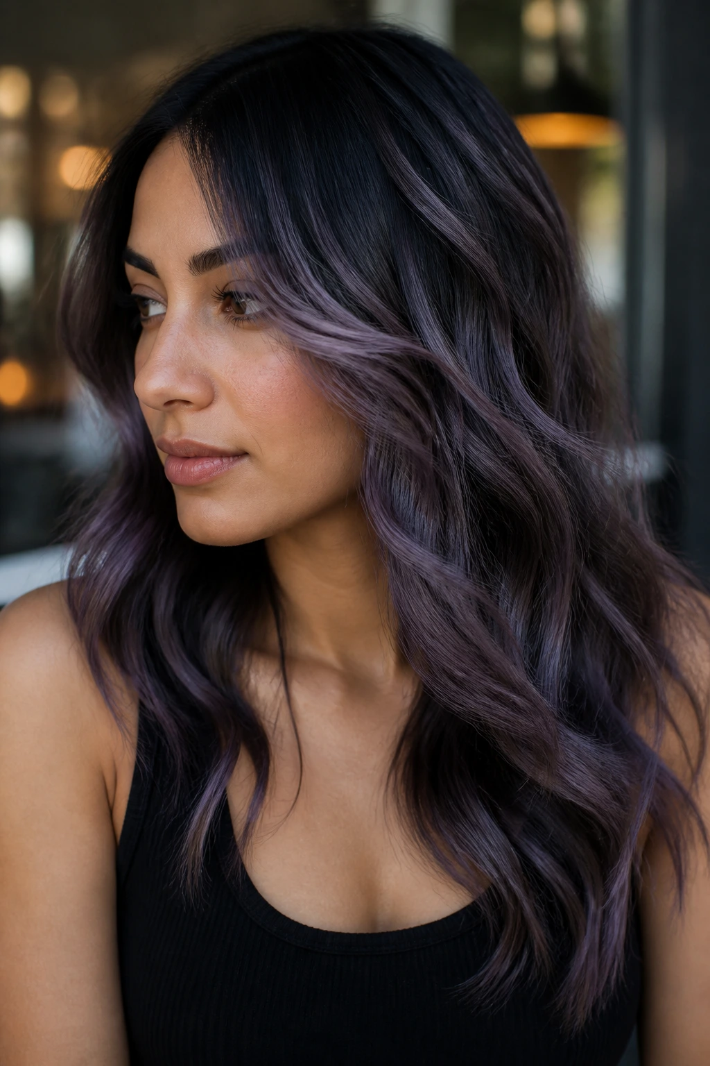 Close-up of real person with smoky lilac waves and dark roots