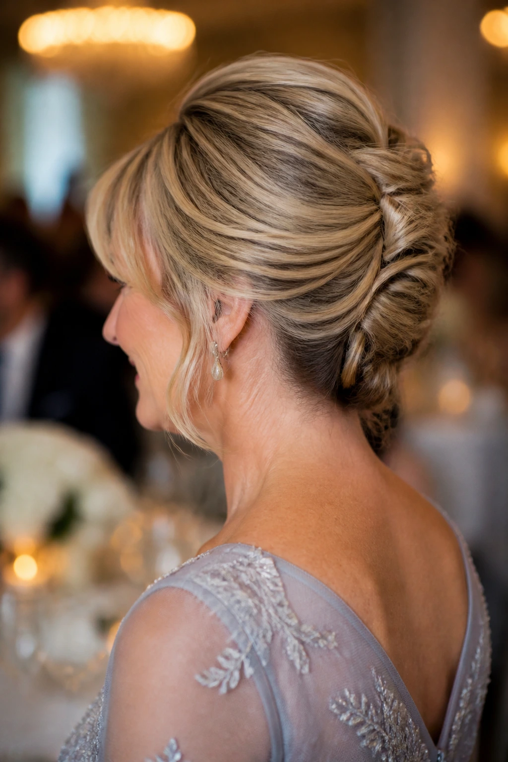 Close-up of a real woman with a soft French twist for shoulder-length hair