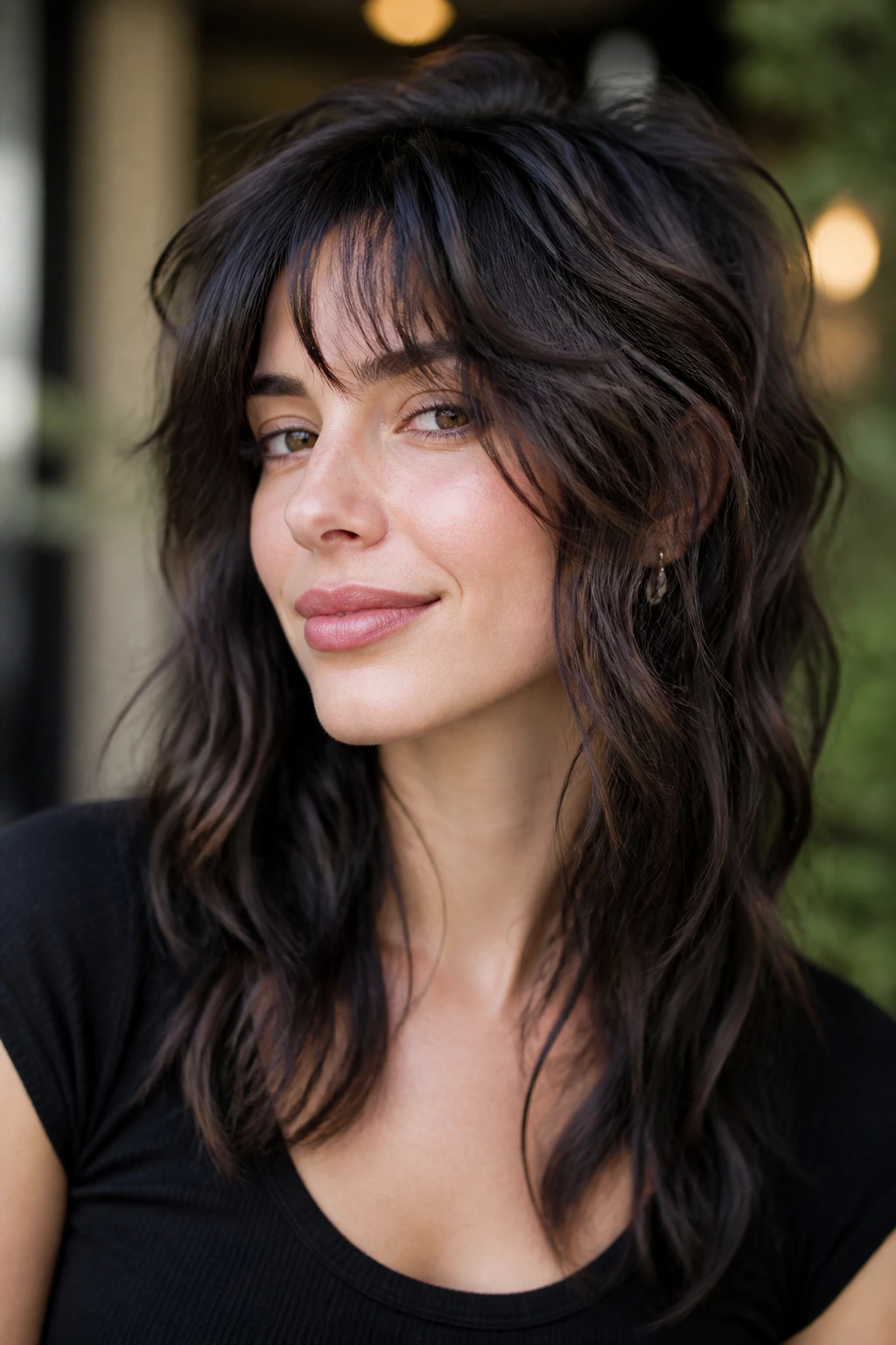 Portrait of a real woman with soft wolf cut and rounded crown