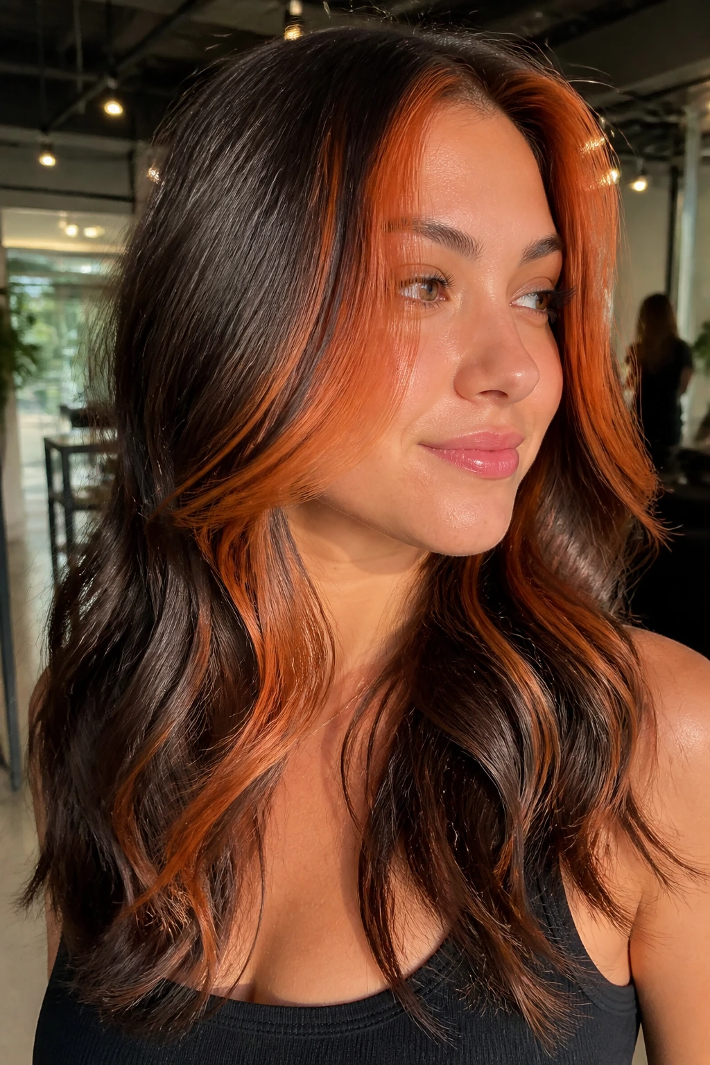 Close-up of brunette with bright copper money pieces at the front.