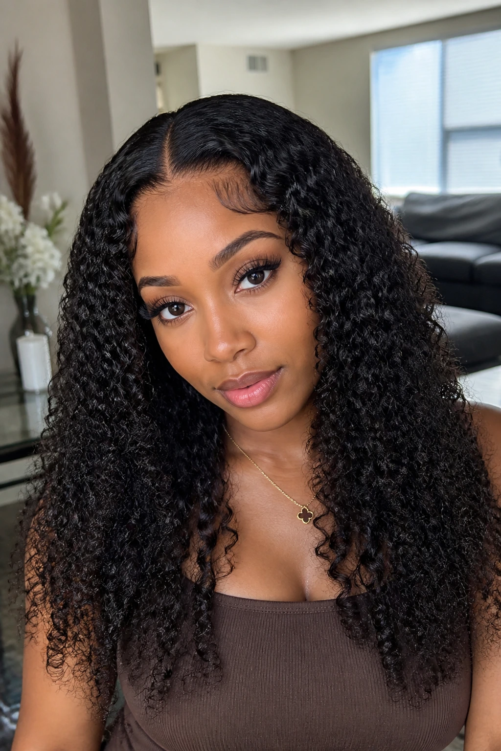Real person wearing a U-part curly wig with leave-out blending with natural hair