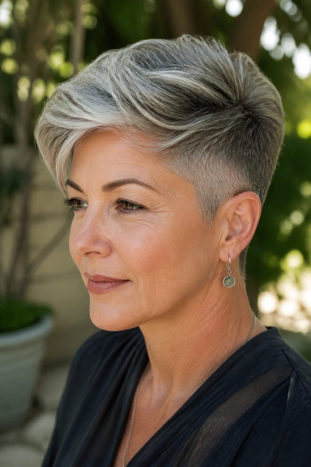 Close-up of a real woman with undercut pixie and soft sweep