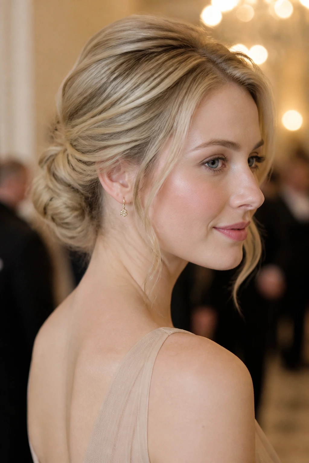 Portrait of a real woman with a warm beige blonde updo.