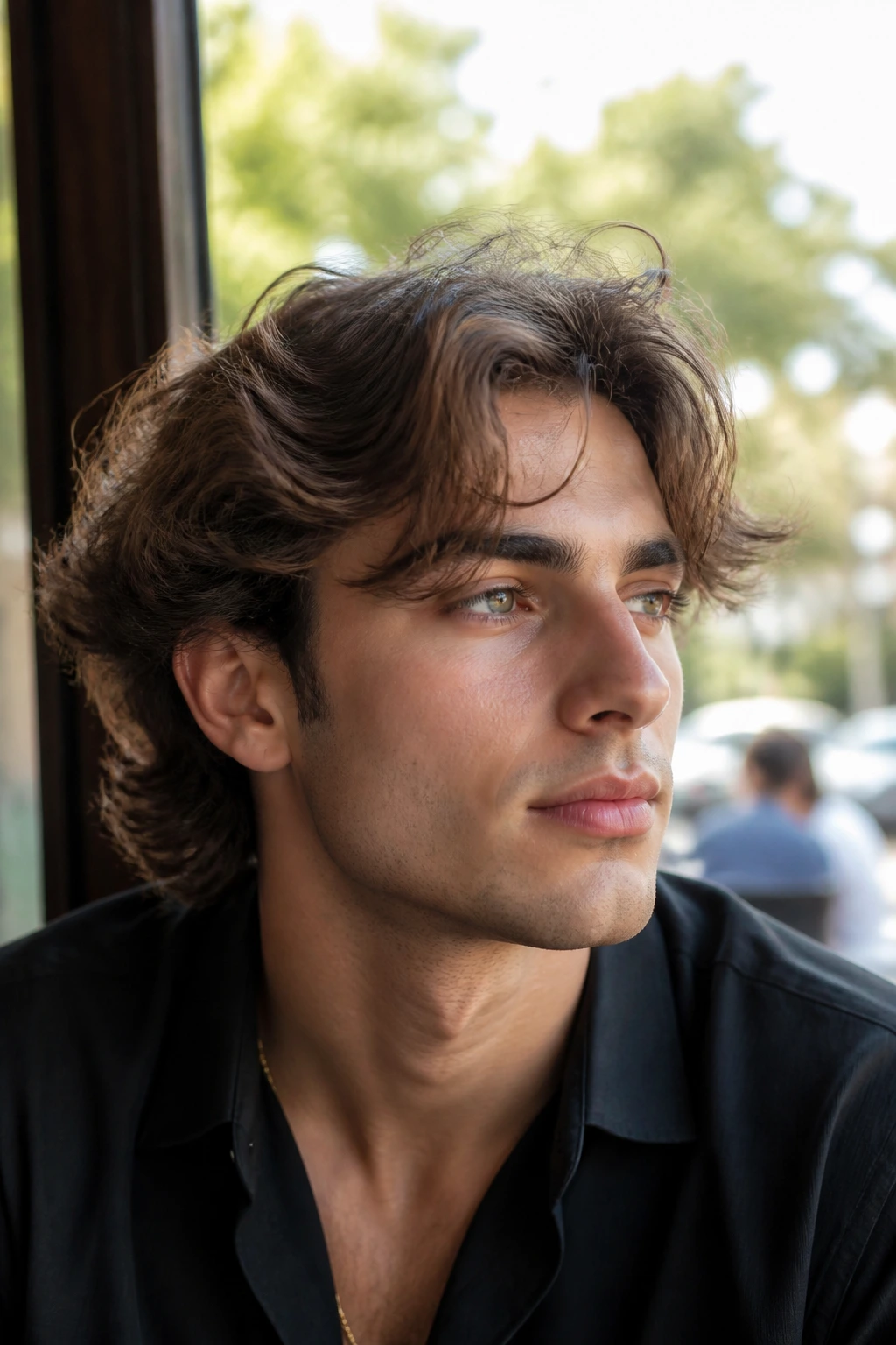 Close-up portrait of a real person with wavy bro flow and curtain bangs in natural light.