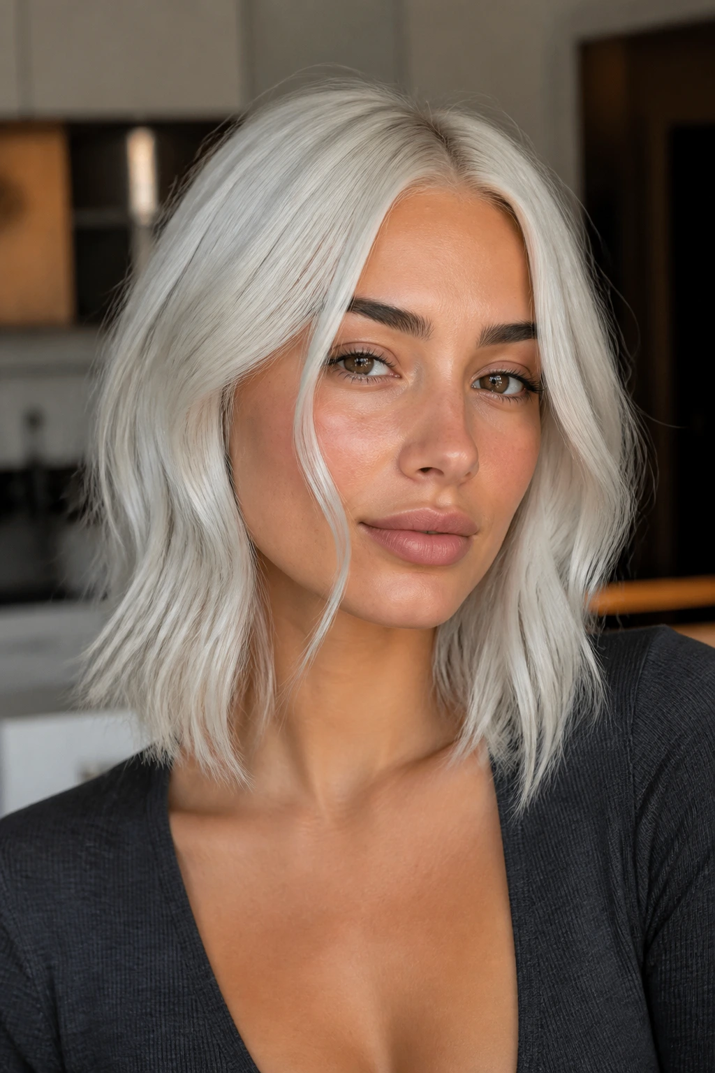 Portrait of a woman with wearable icy platinum hair in natural daylight.