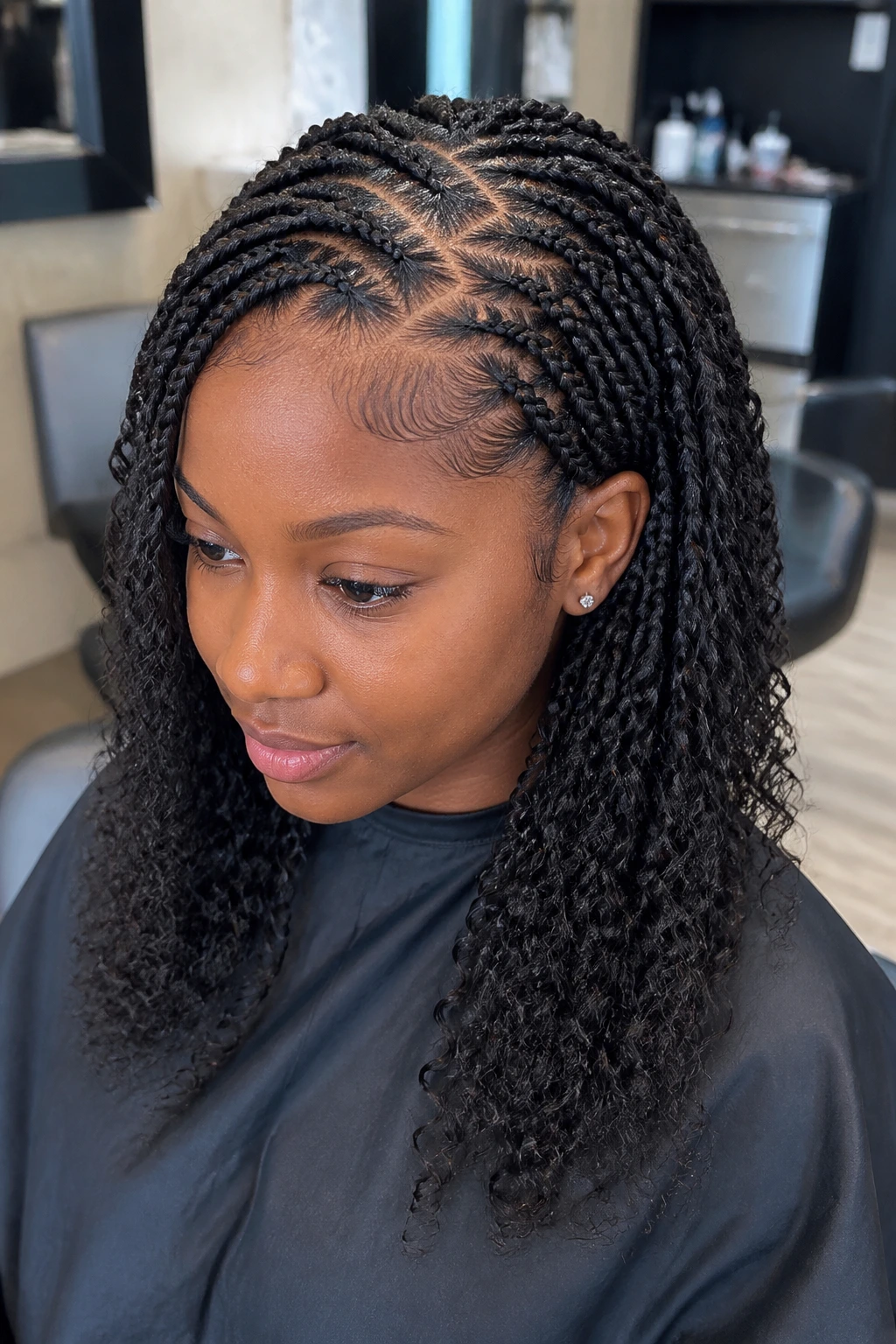 Close-up of zig-zag part with soft curly ends on a real woman