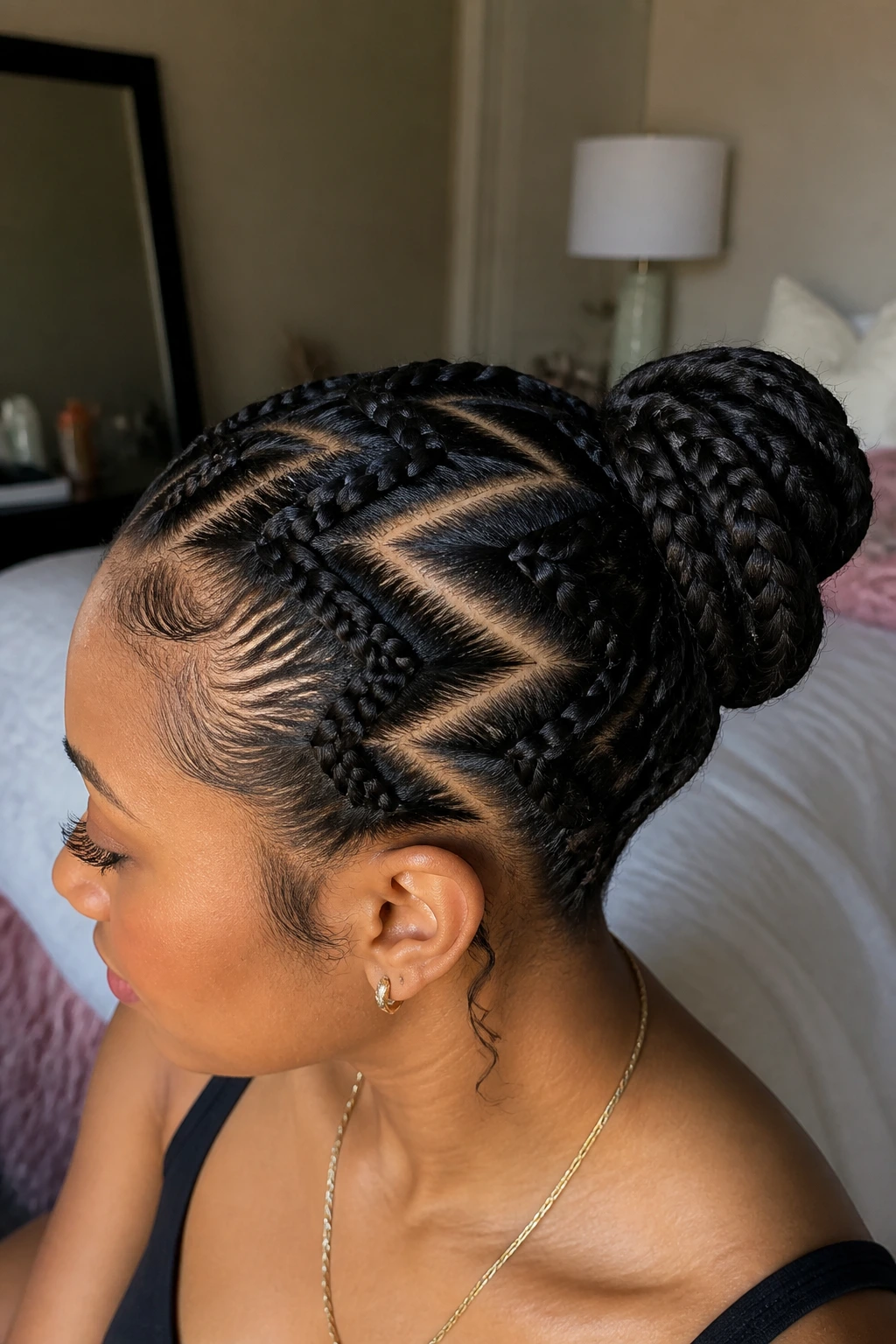 Real person with zigzag-part French bun braids close-up